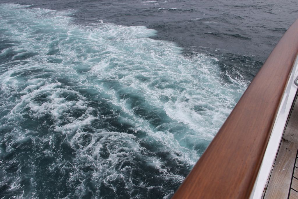 Travelers aboard a cargo vessel navigating the mighty Congo River.