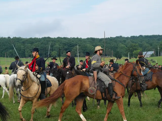 In this image, I can see a group of people holding the swords and sitting on the horses. At the...